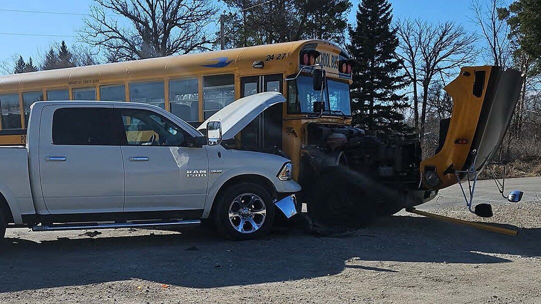 No students injured in collision between school bus, pickup truck on highway west of Winnipeg