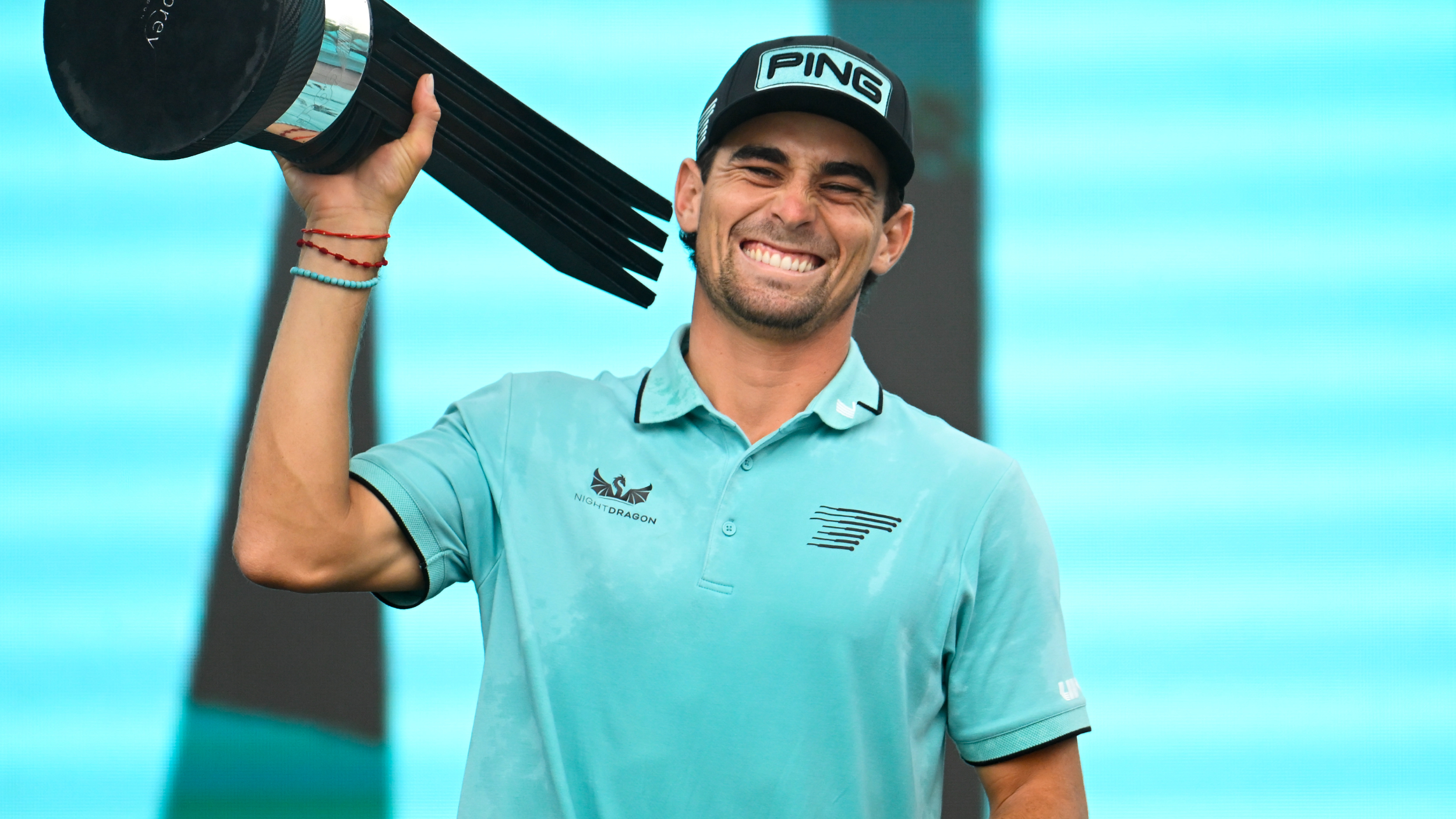 Joaquin Niemann with the LIV Golf Virginia trophy
