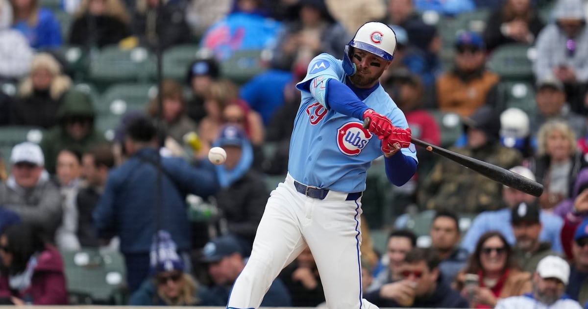 Busch helps Cubs top Diamondbacks in series opener