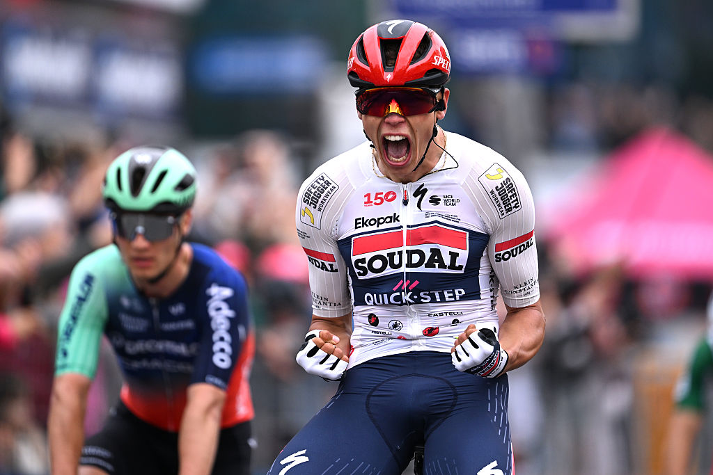 Paul Magnier of France and Team Soudal Quick-Step celebrates at finish line as stage winner during the 109th Giro d'Italia