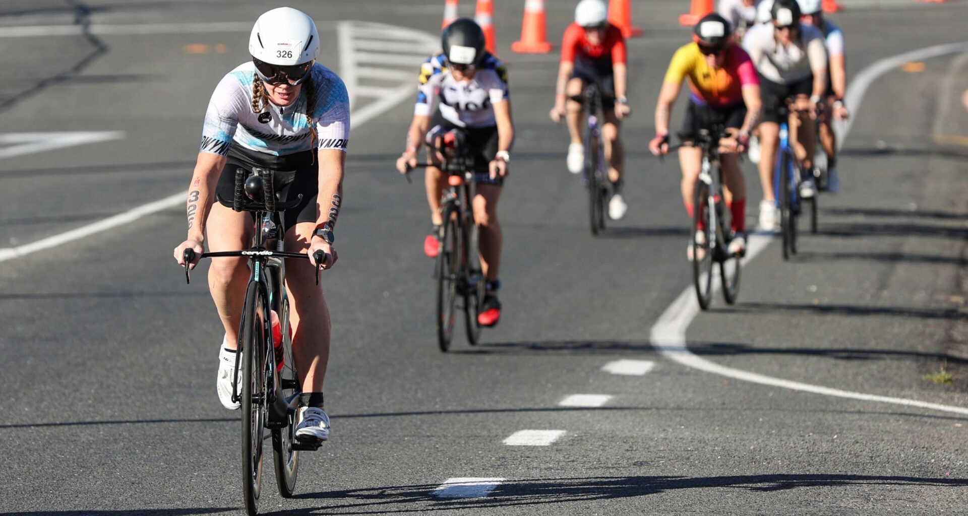 Age-groupers racing the bike portion of a non-drafting triathlon.