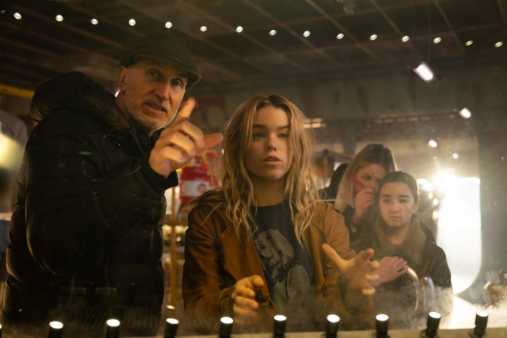 (L to r) Director Craig Gillespie, Milly Alcock and Eve Ridley on the set of DC Studios’ and Warner Bros. Pictures’ “SUPERGIRL”, a Warner Bros. Pictures release. Photo by Parisa Taghizadeh
