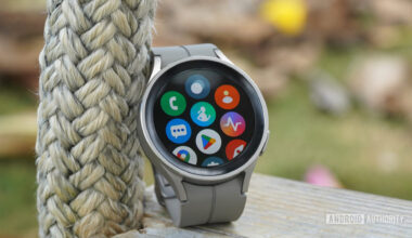 A Samsung Galaxy Watch 5 Pro displays its App Library including Google and Samsung native apps.