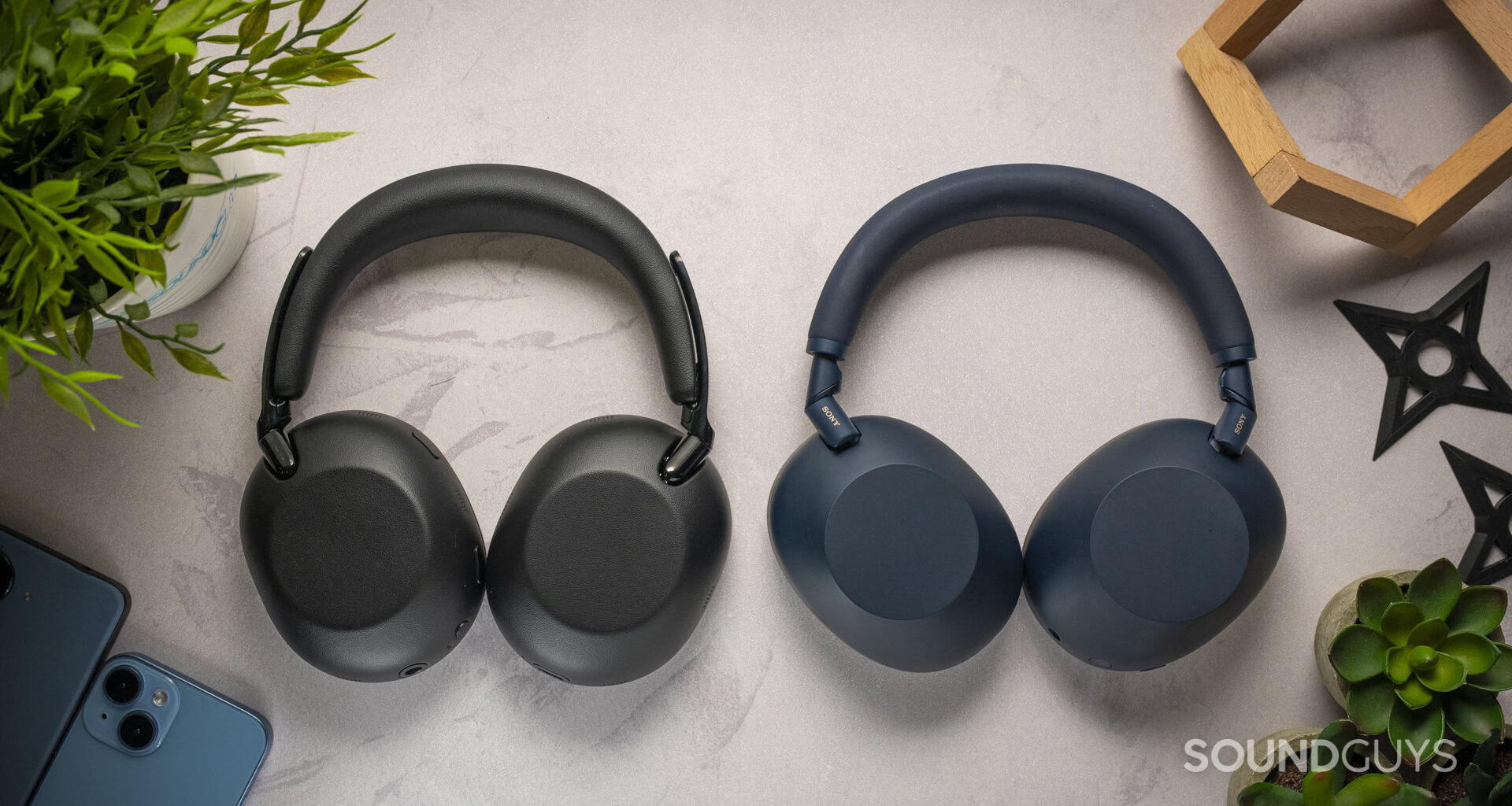 Top down photo of the Sony WH-1000X next to the WH-1000XM6 headphones.