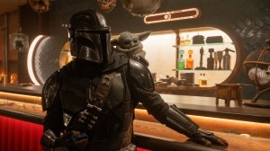 (L-R) Mandalorian (Pedro Pascal) and Grogu in Lucasfilm's THE MANDALORIAN AND GROGU. Photo by Nicola Goode. © 2025 Lucasfilm Ltd™. All Rights Reserved.
