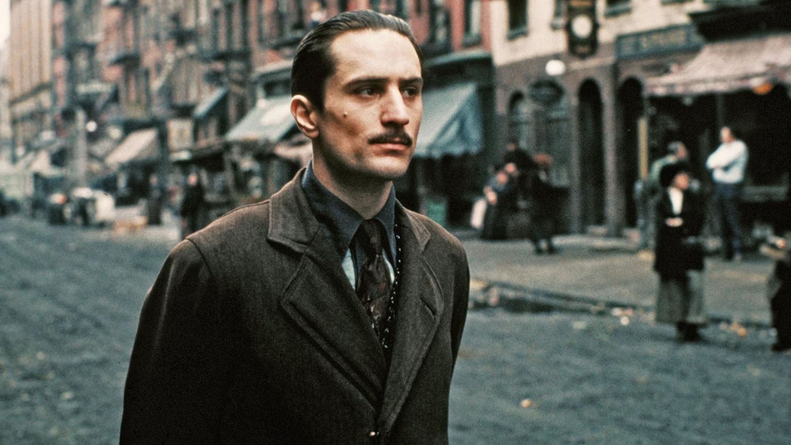 Image may contain Robert De Niro Accessories Formal Wear Tie Face Head Person Photography Portrait and Clothing