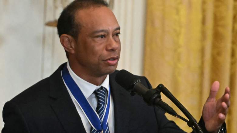 Tiger Woods speaks at an event amid reports he left a Swiss rehab facility early to attend Kai Trump’s graduation.