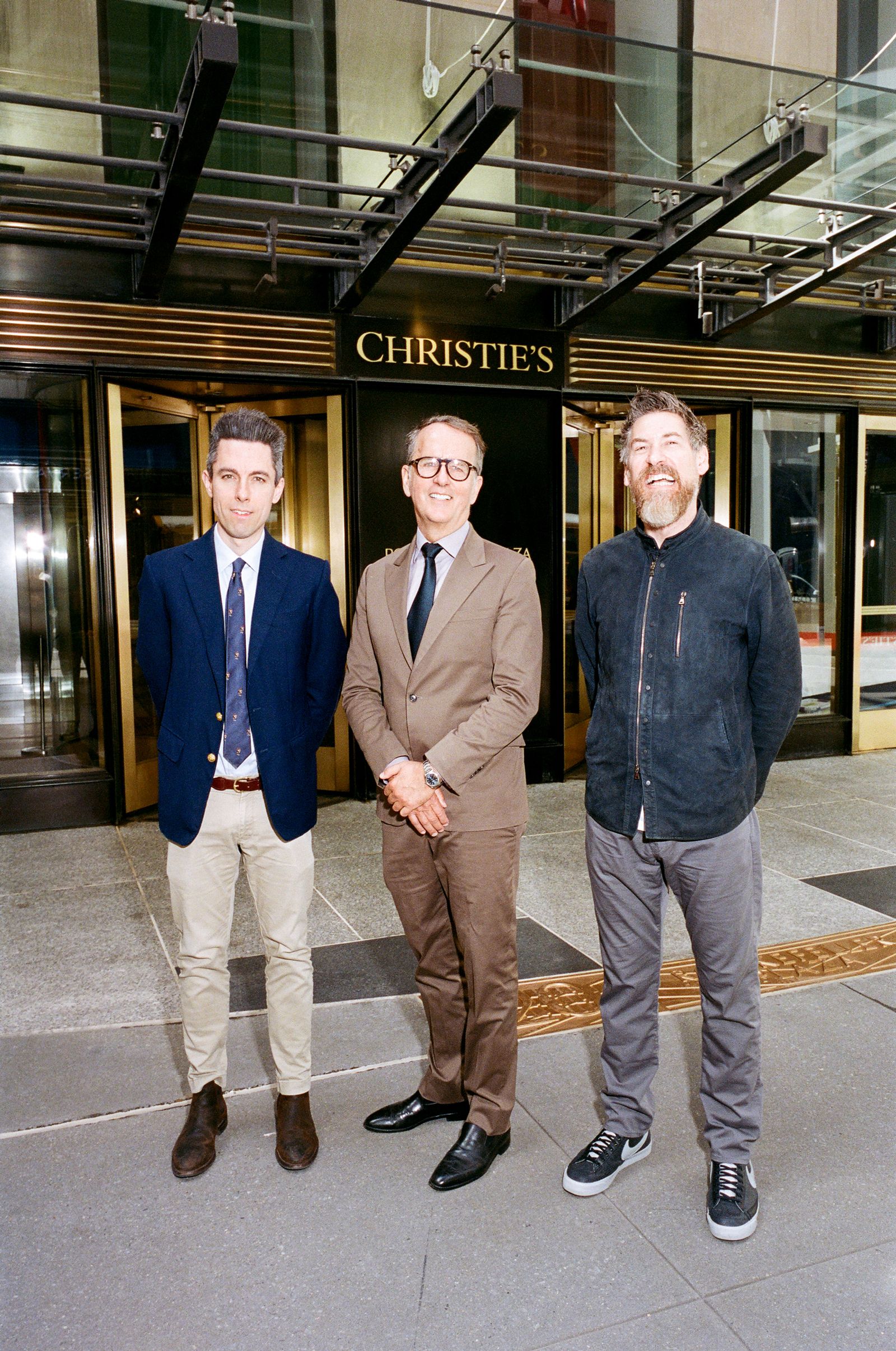 Image may contain Blazer Clothing Coat Jacket Adult Person Groupshot Pants and People
