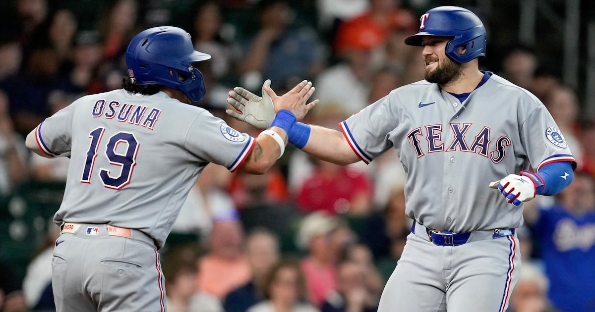 Jake Burger blasts a homer, drives in 4 as Nathan Eovaldi powers Texas Rangers past Houston Astros