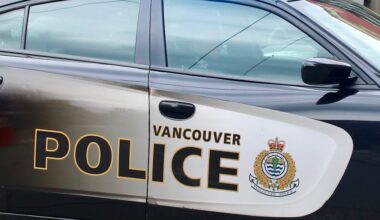 A police car with the Vancouver Police Department logo.