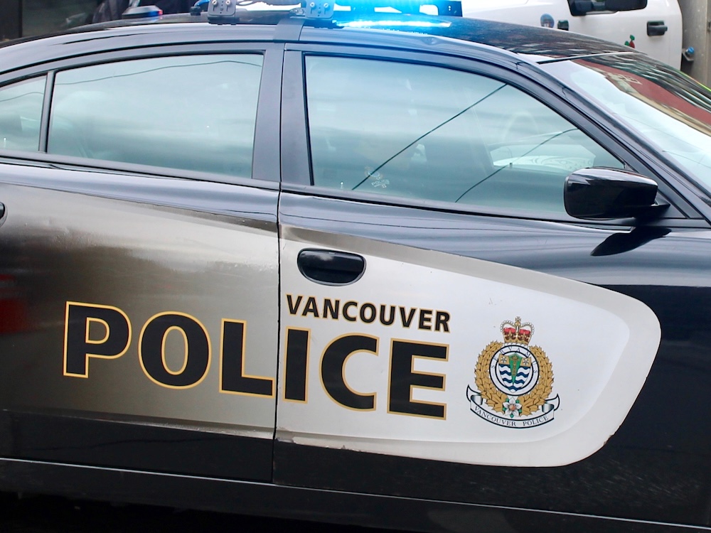 A police car with the Vancouver Police Department logo.