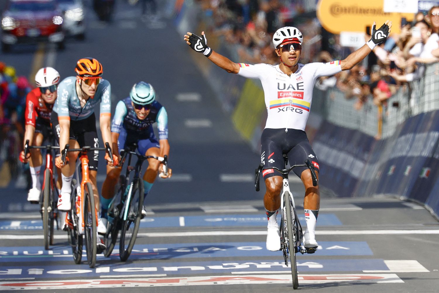 Jhonatan Narvaez celebrates the victory after he crossed the finish line at the 4th stage of the Giro d'Italia