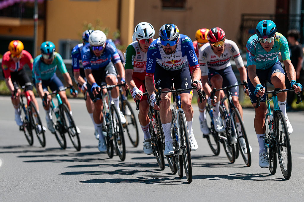 Red Bull - BORA - hansgrohe German rider Nico Denz (C) rides in a breakaway during the 11th stage of the Giro d'Italia 2026 - Tour of Italy cycling race between Porcari and Chiavari, Italy, on May 20, 2026. (Photo by Luca Bettini / AFP)