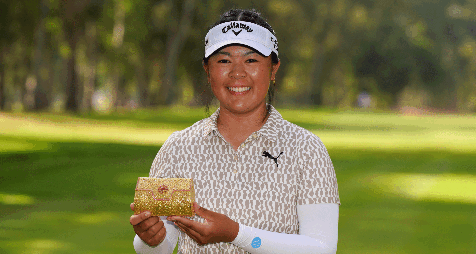 Canada's Anna Huang poses with the Lalla Meryem Cup trophy following her win in 2026