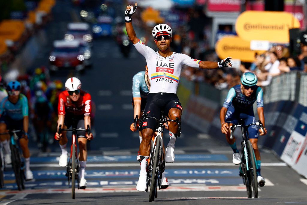 UAE Team Emirates - XRG Ecuadorian rider Jhonatan Narvaez celebrates as he crosses the finish line to win the 4th stage of the Giro d'Italia 2026 - Tour of Italy cycling race between Catanzaro and Cosenza, Italy, on May 12, 2026. (Photo by Luca Bettini / AFP)