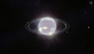 a blue and white orb on a black background