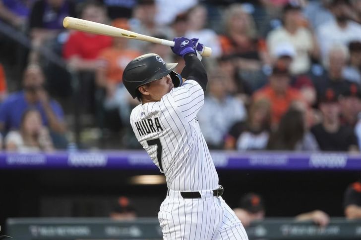 Keston Hiura of the Colorado Rockies hits an RBI single off San Francisco Giants starter Robbie Ray during the clubs' Major League Baseball regular-season game at Coors Field in Denver, June 11, 2025. AP-Yonhap