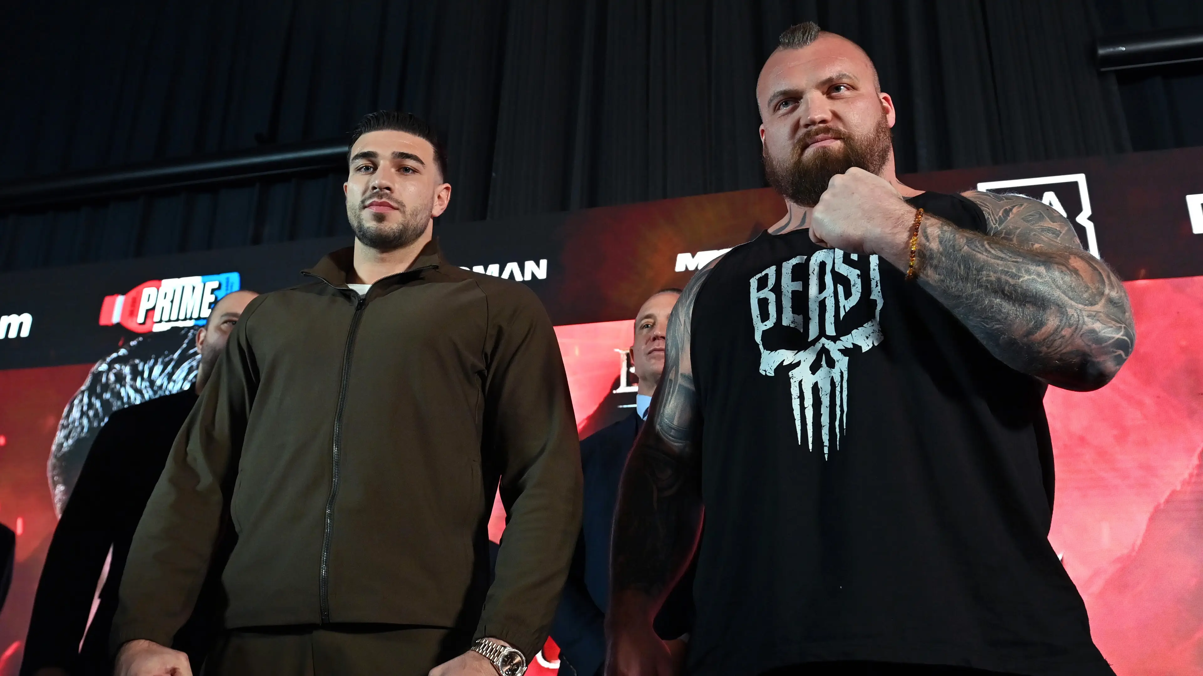 Tommy Fury (left) and Eddie Hall (right) pose for a photo after facing off during the Beauty Vs The Beast: Fury v Hall Press Conference at Glaziers Hall 