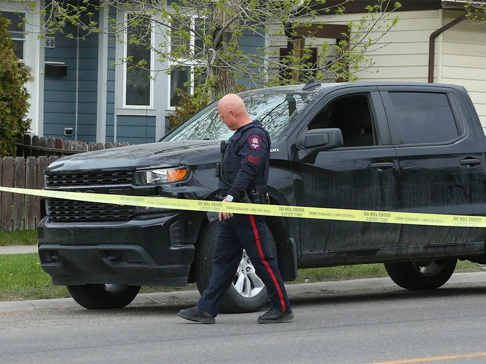 Calgary police investigate at the scene where a young boy was hit by a pickup truck on Castleridge Drive N.E. in Calgary on Wednesday, May 13, 2026. The boy was transported to hospital.