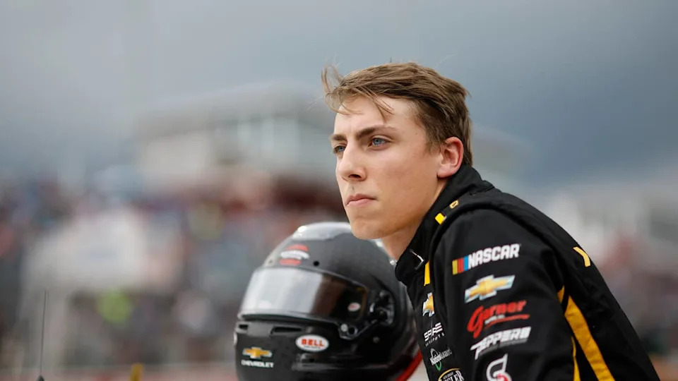 NORTH WILKESBORO, NORTH CAROLINA - MAY 17: Carson Hocevar, driver of the #77 NASCAR Day Giveathon Chevrolet, looks on during qualifying for the NASCAR Cup Series All-Star Open at North Wilkesboro Speedway on May 17, 2024 in North Wilkesboro, North Carolina. (Photo by Sean Gardner/Getty Images)Sean Gardner/Getty Images