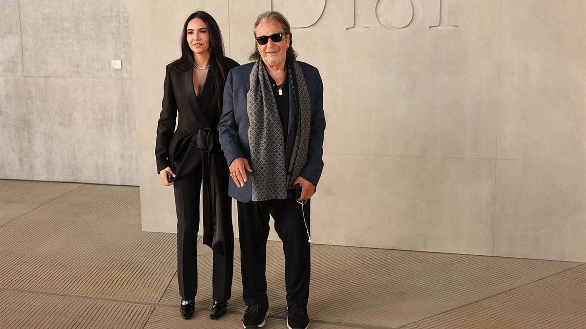 US actor Al Pacino and partner Noor Alfallah attending Dior fashion show at LACMA in Los Angeles