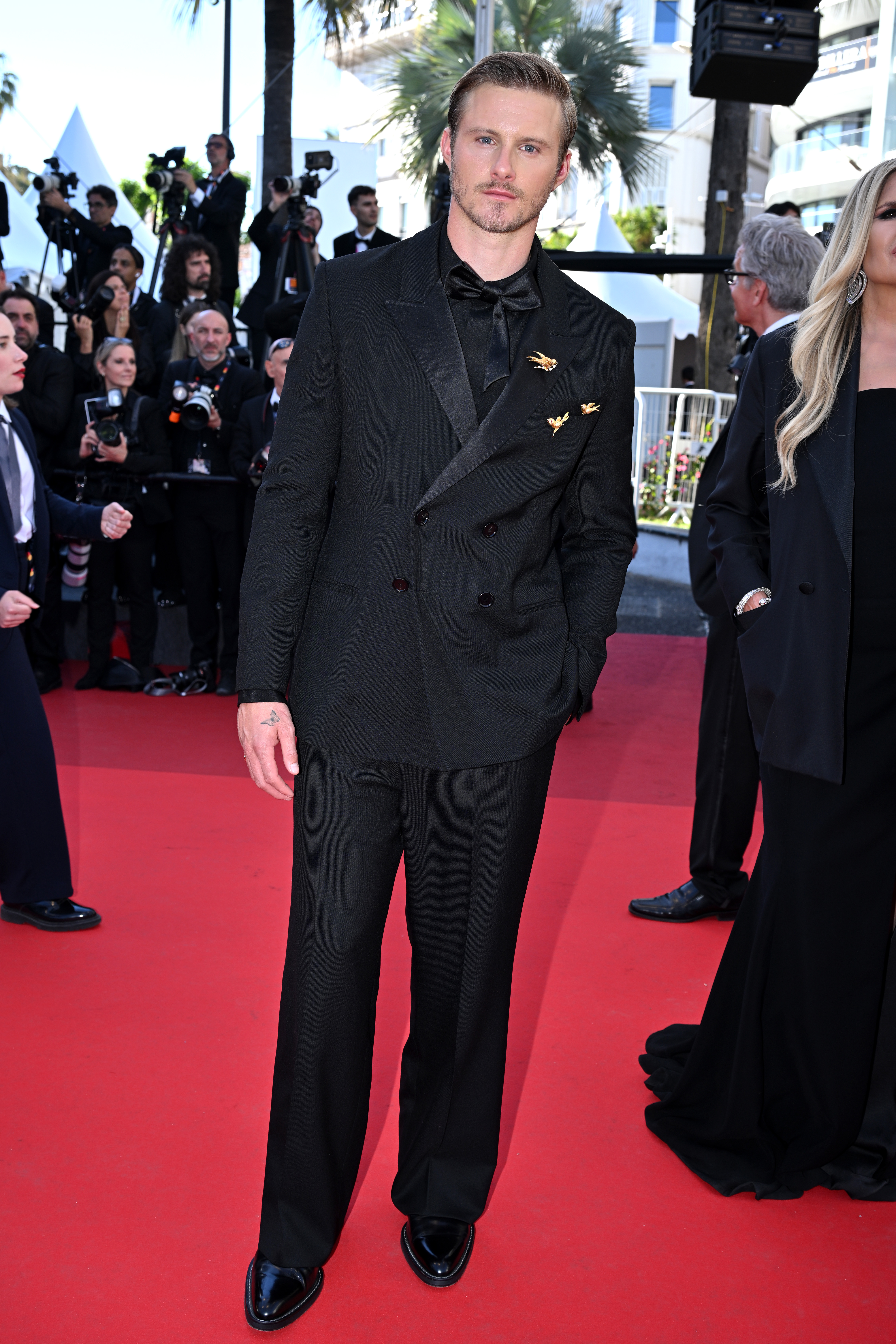 Alexander Ludwig wearing Ami Paris