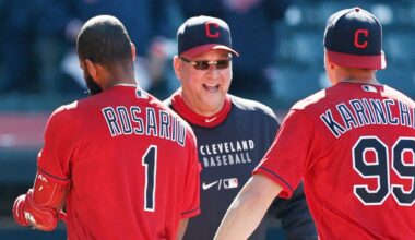 In this Wednesday, May 12, 2021 file photo, Cleveland Indians manager Terry Francona, center, celebrates with Amed Rosario (1) and James Karinchak (99) after defeating the Chicago Cubs 2-1 in 10 innings of a baseball game in Cleveland.