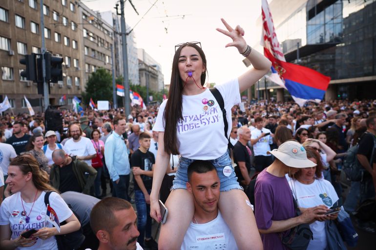 Anti-government protesters take part in a rally led by Serbia's protesting university students who are pushing for major political changes in the Balkan country run by President Aleksandar Vucic, in Belgrade, Serbia, Saturday, May. 23, 2026. (AP Photo/Armin Durgut)