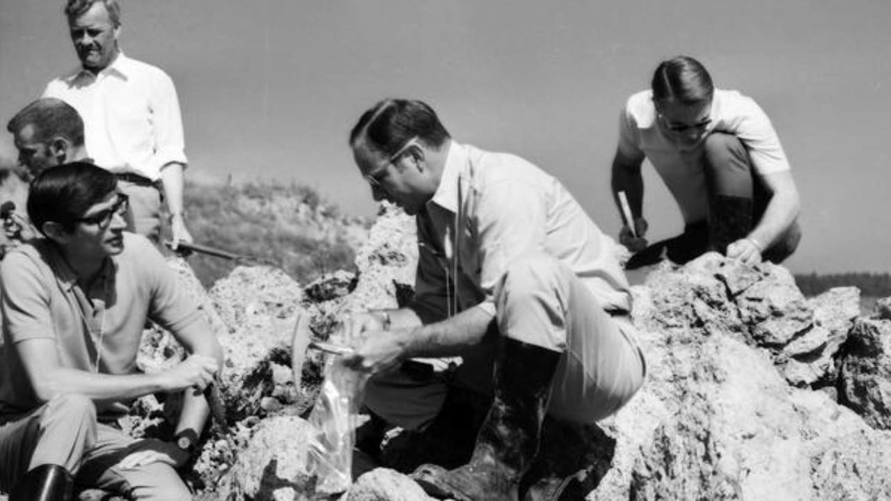 Apollo-era astronauts and geologists examine impact rocks at Germany’s Ries crater during NASA field training for lunar missions in the late 1960s. Apollo-era astronauts and geologists examine impact rocks at Germany’s Ries crater during NASA field training for lunar missions in the late 1960s.