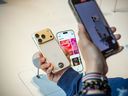 A customer looks at an iPhone 17 at an Apple Store in Beijing.  
