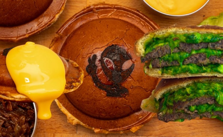 A sealed, flying-saucer-style taco burger with a crunchy Doritos and cheese crust from The Burger Joint.