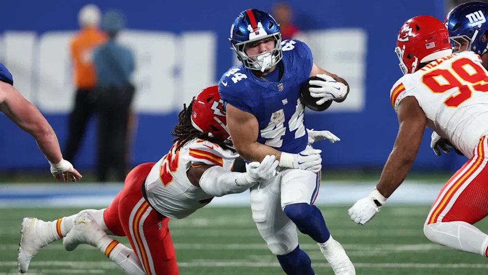 Sep 21, 2025; East Rutherford, New Jersey, USA; New York Giants running back Cam Skattebo (44) runs against <a class="link " href="https://sports.yahoo.com/nfl/teams/kansas-city/" data-i13n="sec:content-canvas;subsec:anchor_text;elm:context_link" data-ylk="slk:Kansas City Chiefs;sec:content-canvas;subsec:anchor_text;elm:context_link;itc:0" data-yga="{"yLinkElement":"context_link","yModuleName":"content-canvas","yLinkText":"Kansas City Chiefs","ySubModuleName":"anchor_text","yHasCommerce":false}">Kansas City Chiefs</a> linebacker <a class="link " href="https://sports.yahoo.com/nfl/players/33446/" data-i13n="sec:content-canvas;subsec:anchor_text;elm:context_link" data-ylk="slk:Nick Bolton;sec:content-canvas;subsec:anchor_text;elm:context_link;itc:0" data-yga="{"yLinkElement":"context_link","yModuleName":"content-canvas","yLinkText":"Nick Bolton","ySubModuleName":"anchor_text","yHasCommerce":false}">Nick Bolton</a> (32) in the second quarter at MetLife Stadium. Mandatory Credit: Vincent Carchietta-Imagn Images© Vincent Carchietta-Imagn Images