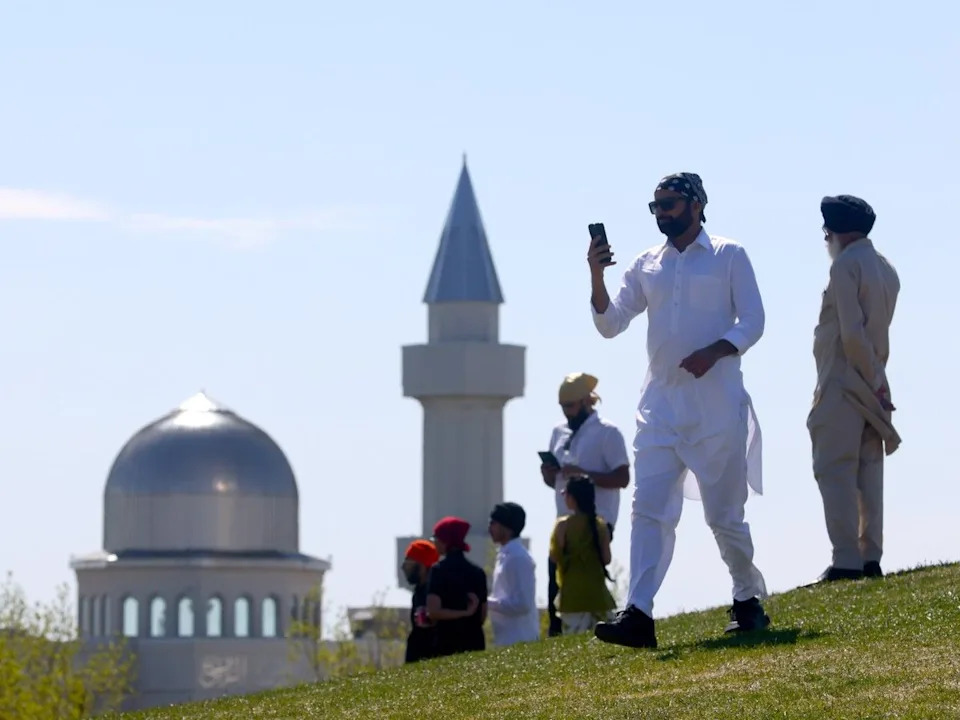  A man at the Nagar Kirtan festival at Prairie Winds Park on May 11, 2024.
