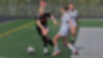 Juneau-Douglas High School: Yadaa.at Kalé junior Riley Schultz plays a ball past Service freshman Taylyn Reed during the Crimson Bears 4-0 win over the Cougars in the consolation semifinals of the ASAA girls Soccer State Championships at Colony on Friday, May 29, 2026. (Klas Stolpe / Juneau Independent)