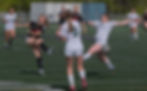 Juneau-Douglas High School: Yadaa.at Kalé senior Peyton Wheeler puts a shot past Service freshman Taylyn Reed (9) and sophomore Fiona Watts (23) during the Crimson Bears’ 4-0 win over the Cougars in the consolation semifinals of the ASAA girls Soccer State Championships at Colony on Friday, May 29, 2026. (Klas Stolpe / Juneau Independent)
