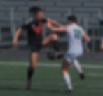 Juneau-Douglas High School: Yadaa.at Kalé sophomore Ayla Erickson (16) wins a ball from Service junior Lauryn Stacy (18) during the Crimson Bears’ 4-0 win over the Cougars in the consolation semifinals of the ASAA girls Soccer State Championships at Colony on Friday, May 29, 2026. (Klas Stolpe / Juneau Independent)