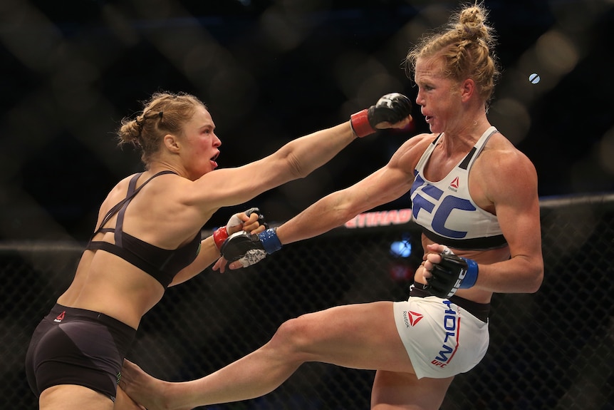 Ronda Rousey fighting Holly Holm in 2015.