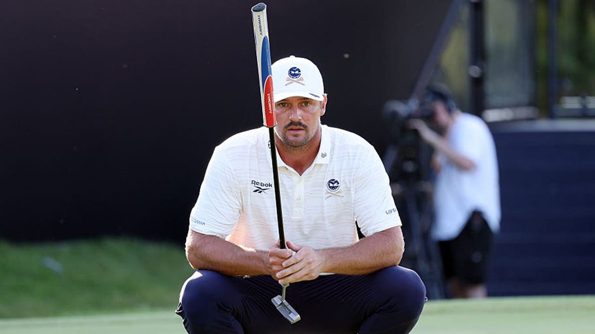 Bryson DeChambeau of Crushers lines up a putt
