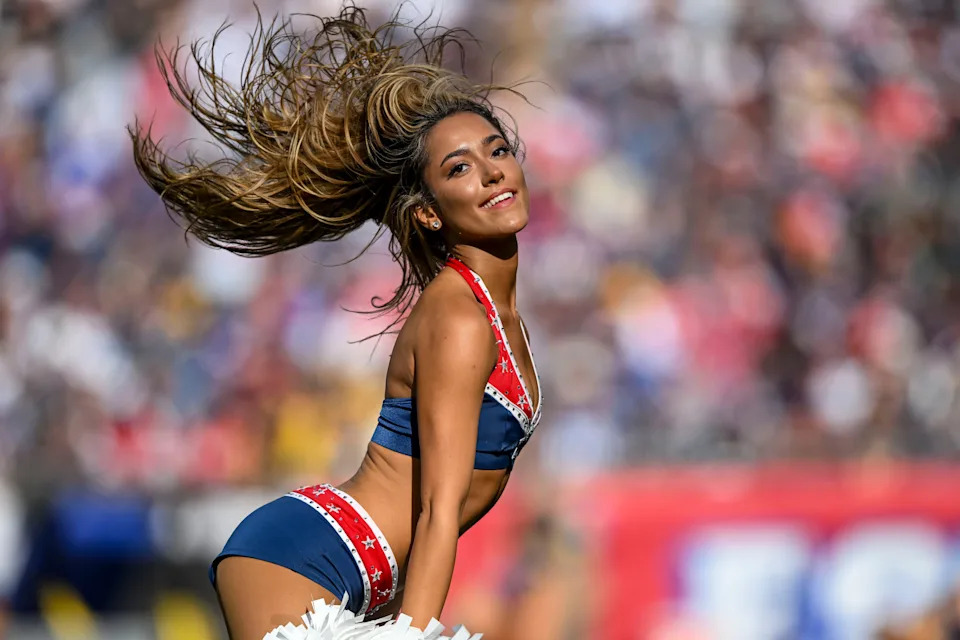 A New England Patriots cheeleader during the fourth quarter at Gillette Stadium.