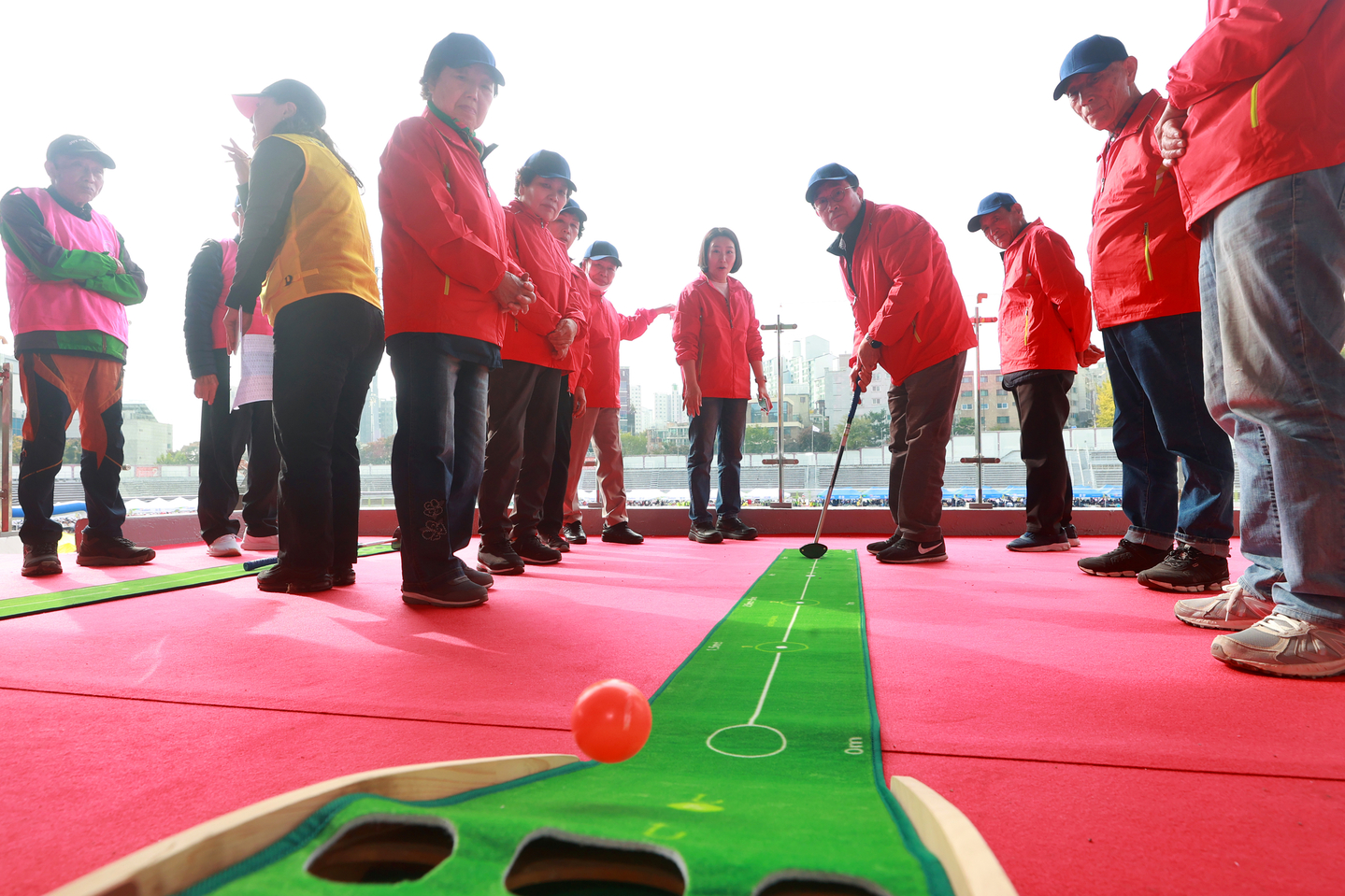 Participants compete in a park golf event at the Senior Olympics at Hyochang Stadium in Yongsan District, Seoul, on Oct. 31, 2025. [YONHAP]