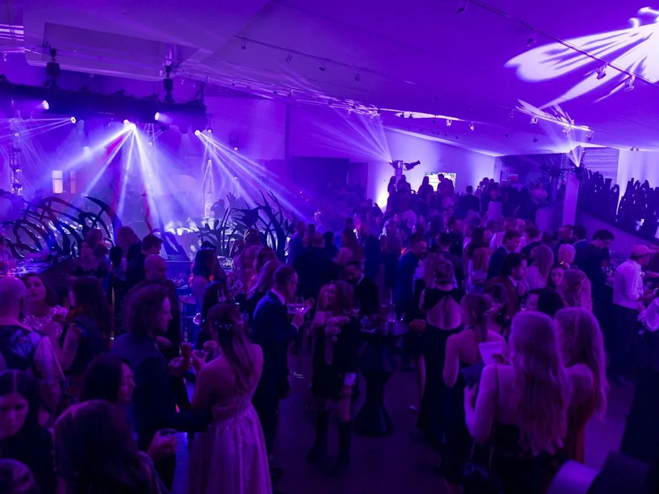 Guests gather inside the historic Centennial Planetarium atrium for a series of otherworldly cabaret performances that included TR/ST, Hermitess and Dan Solo.