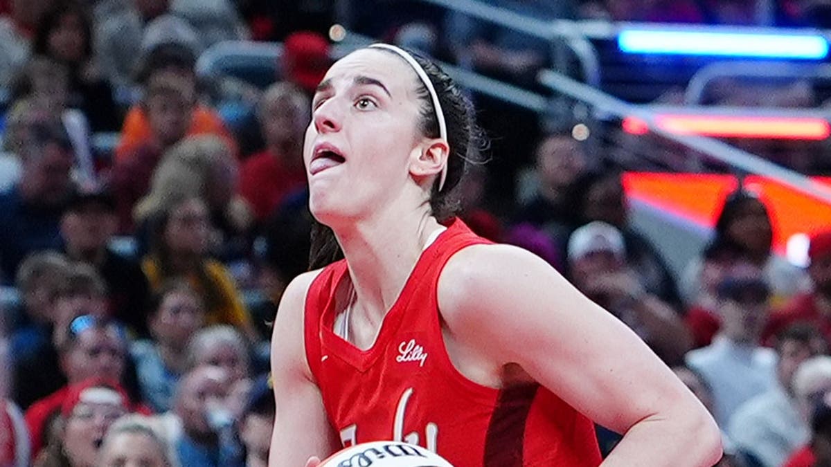 Indiana Fever guard Caitlin Clark drives to the basket at Gainbridge Fieldhouse in Indianapolis