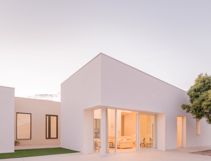 casa violetas balances enclosure and openness through courtyard living in madrid - 2