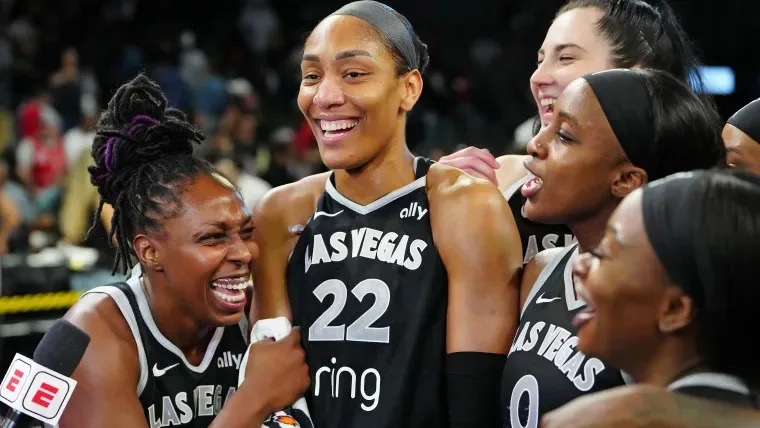Las Vegas Aces guard Chelsea Gray (12), Las Vegas Aces center A'ja Wilson (22), and Las Vegas Aces guard Jackie Young (0)
