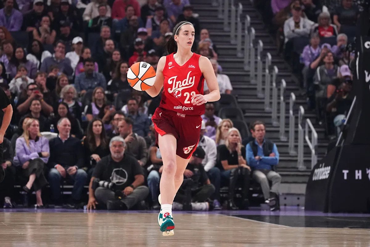 Caitlin Clark becomes fastest player in WNBA history to reach 1,000 points and 500 assists as Valkyries pull off narrow win
