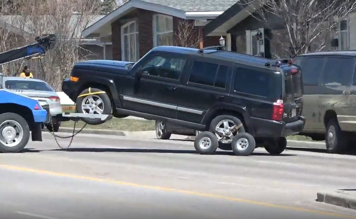 Father charged with killing son, 5, daughter, 3, found in vehicle in Calgary
