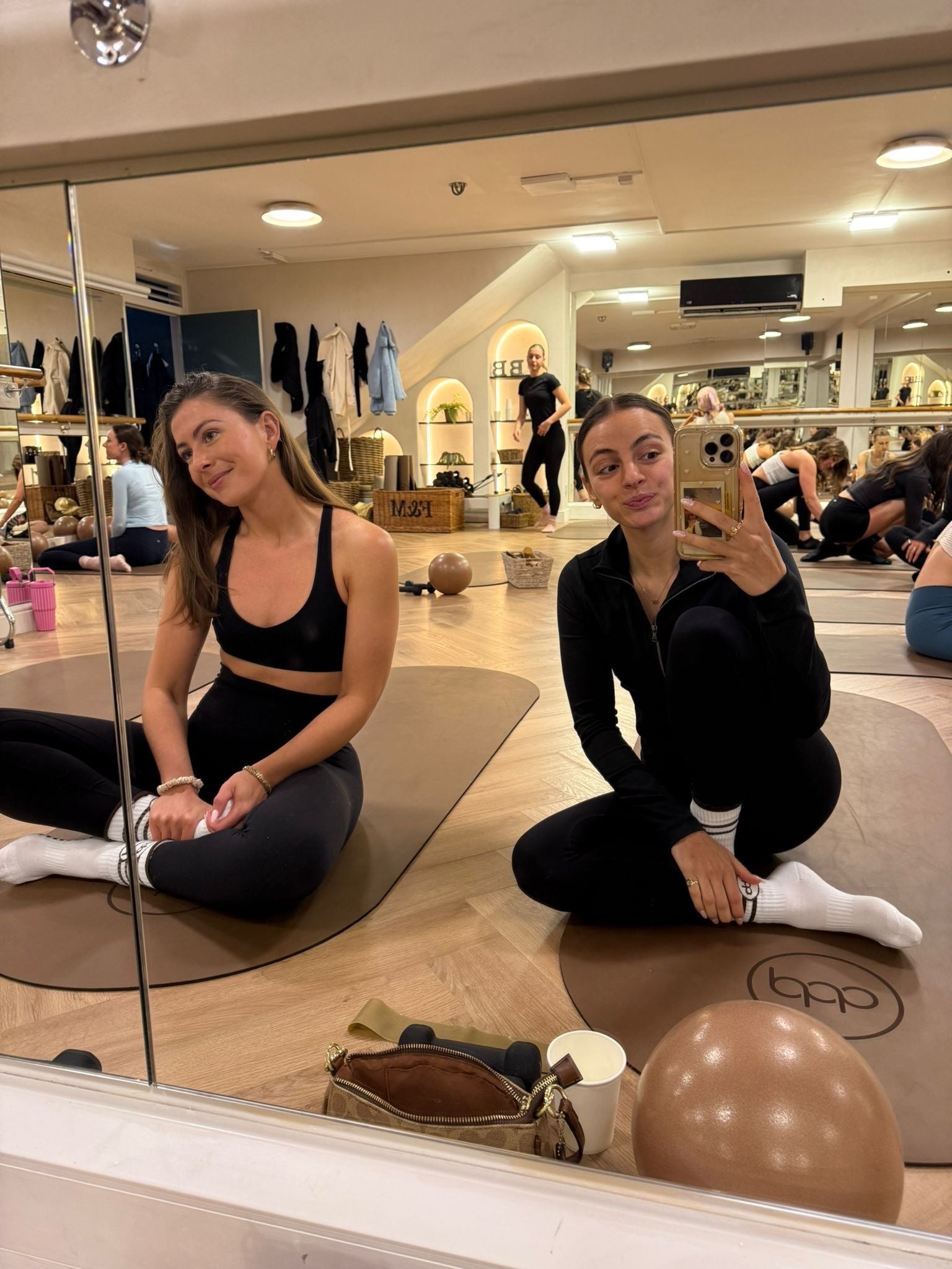 Mood booster: Lydia and her friend Molly in Paola’s studio in Fulham
