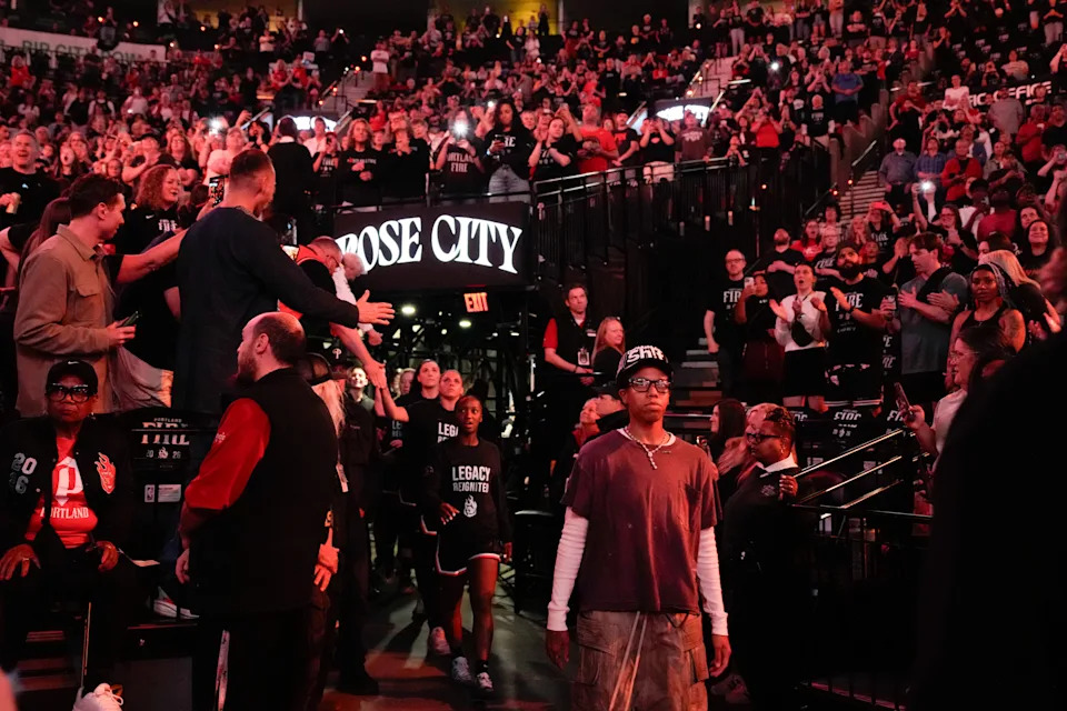 Portland Fire players take the court before a WNBA basketball game against the Chicago Sky, Saturday, May 9, 2026, in Portland, Ore. (AP Photo/Jenny Kane)