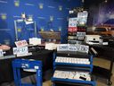 Two brothers were arrested when Peel Regional Police officers seized items allegedly used to produce and distribute counterfeit licence plates while executing search warrants at two Hamilton addresses on April, 7, 2026. 