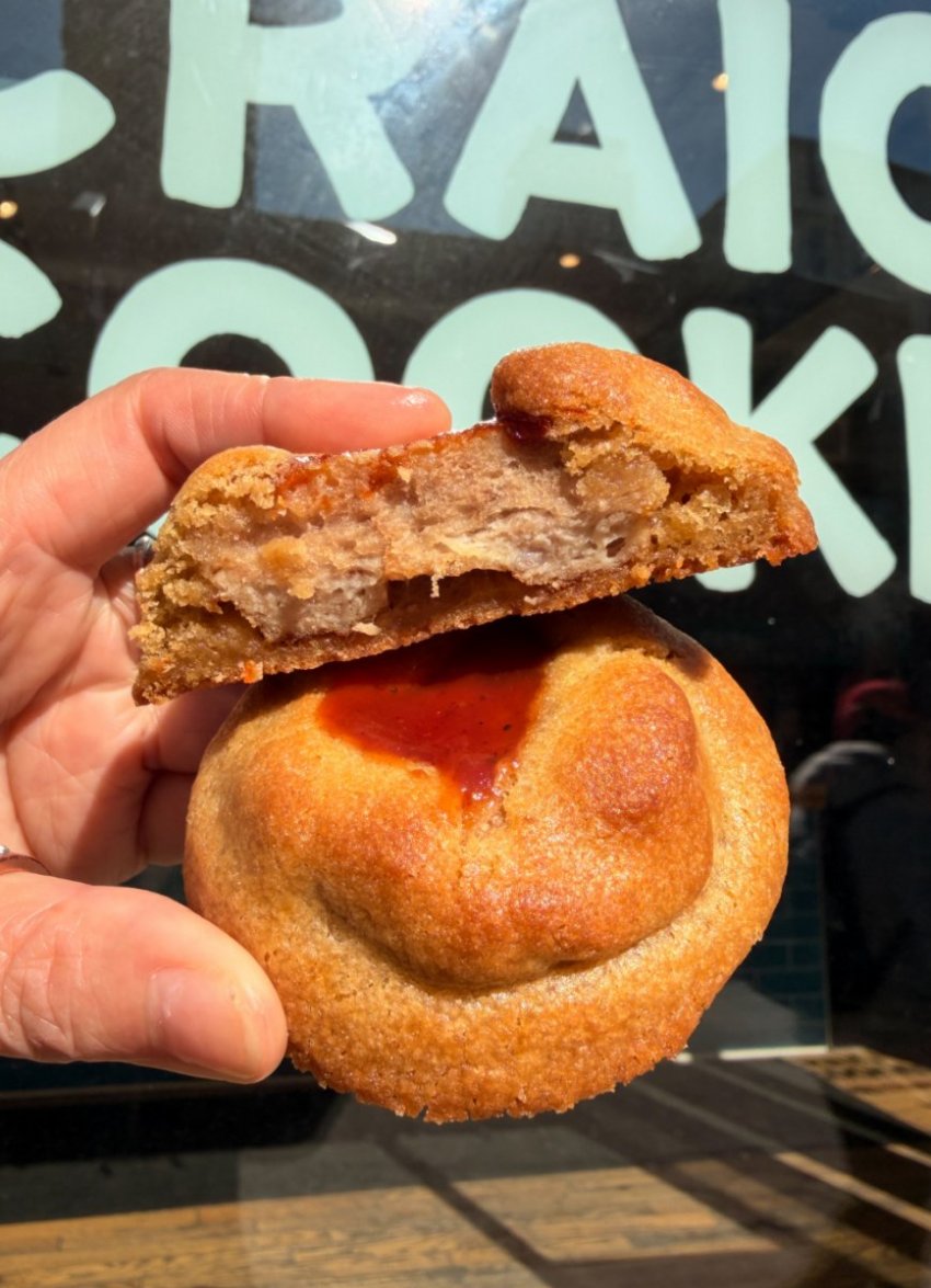 Photos of new midway foods for 2026 provided by Calgary Stampede. A thick chocolate chip cookie stuffed with a piece of savory smoky BBQ rib meat on a display platter.